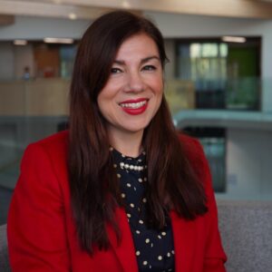 Kathy Kotiadis wearing red