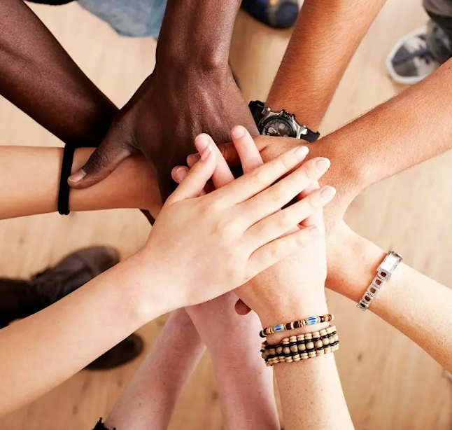 hands put on top of each other